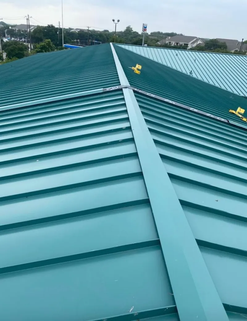 Green commercial metal roof ridge and valley for Metal Roof Repair in Martin
