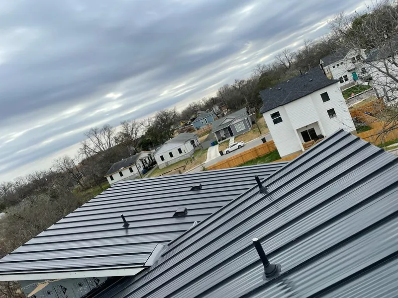 Standing seam metal roof panels with vents for Skylight Repair in Martin